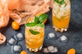 Fresh summer cocktail with orange juice and ice cubes. Glass of orange soda drink on dark background Royalty Free Stock Photo