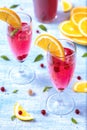 Fresh summer cocktail with orange, red currant, mint leaf Royalty Free Stock Photo