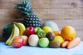 Fresh summer fruits on wooden table background - mix of fruits Royalty Free Stock Photo