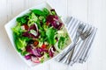 Fresh summer green salad mix on a wooden table Royalty Free Stock Photo