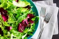 Fresh summer green salad mix on a wooden table Royalty Free Stock Photo