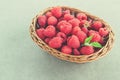 Fresh summer raspberry in a basket. Selective focus. Royalty Free Stock Photo