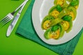 Fresh summer salad from green heirloom tomato Kiwi, fresh basil leaves and extra virgin olive oil Royalty Free Stock Photo