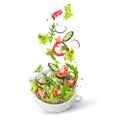 Fresh summer salad of greens and vegetables sprinkled in a deep plate. Royalty Free Stock Photo