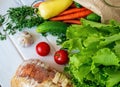 Fresh summer vegetables on a white wooden background. Royalty Free Stock Photo