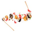 Fresh sushi rolls with ingredients in the air, isolated on white background Royalty Free Stock Photo