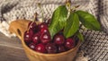 Fresh suur cherries  in rustic bowl Royalty Free Stock Photo