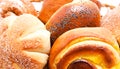 Fresh sweet buns and rolls with poppy and cream