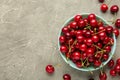Fresh sweet cherries bowl on grey background, top view Royalty Free Stock Photo
