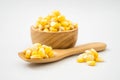 fresh sweet corn in wood bowl and spoon isolated Royalty Free Stock Photo