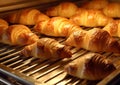 Fresh sweet croissants in bakery oven.Macro.AI Generative