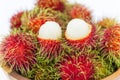 Fresh Sweet fruits rambutan in the wood cup