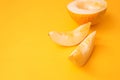 Fresh sweet orange melon on yellow table. Summer fruit concept Royalty Free Stock Photo