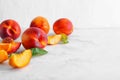 Fresh sweet peaches on light background Royalty Free Stock Photo