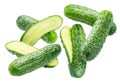 Fresh sweet small cucumbers and cucumber slices levitating in air. Cucumbers that are used to pickling or slicing. File contains