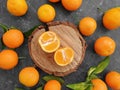Fresh tangerines on concrete background design seasonal