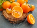 Fresh tangerines organic citrus vitamin on concrete background design seasonal