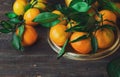 Fresh tangerines on wooden background Royalty Free Stock Photo