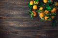 Fresh tangerines on wooden background Royalty Free Stock Photo