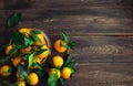 Fresh tangerines on wooden background Royalty Free Stock Photo