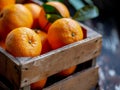 Fresh tangerines in a wooden box. Selective focus. Generative AI