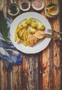 Fresh and tasty baked salmon served with young boiled potatoes and yellow bean. Royalty Free Stock Photo