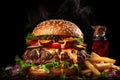 Fresh tasty beef burger with french fries on dark background