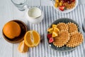 Fresh tasty breakfast with waffles and milk on table top Royalty Free Stock Photo