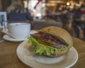 Fresh tasty Burger with pork on a wooden table Royalty Free Stock Photo