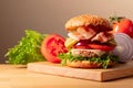 Fresh tasty burger on a wooden cutting board