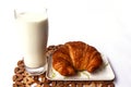 Fresh and tasty croissant and milk Royalty Free Stock Photo