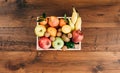 Fresh tasty fruit in a wooden crate Royalty Free Stock Photo