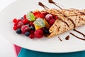 Fresh tasty homemade crepe pancake and fruits