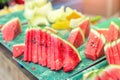 Fresh tasty juicy sliced watermelon and melon on tray outdoors Royalty Free Stock Photo