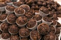 Fresh tasty muffins on display in bakery