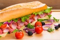 Fresh tasty sandwich with ham, close-up view Royalty Free Stock Photo