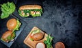 Fresh and tasty sandwiches with ham, prosciutto, cheese, lettuce salad and vegetables Royalty Free Stock Photo