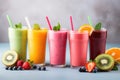 fresh tasty smoothies with different fruits Royalty Free Stock Photo