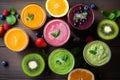 fresh tasty smoothies with different fruits Royalty Free Stock Photo