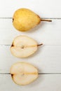 Fresh tasty yellow pear fruits isolated on a white background. Royalty Free Stock Photo