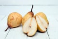 Fresh tasty yellow pear fruits isolated on a white background. Royalty Free Stock Photo