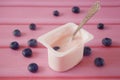 Fresh tasty yogurt  and blueberries on wooden background. Healthy Breakfast Concept Royalty Free Stock Photo