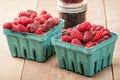 Fresh Tayberries and jars of homemade jam Royalty Free Stock Photo