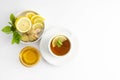 Fresh tea with lemon and honey on a white background. Hot tea cup isolated, top view flat lay. Flat lay. Autumn, fall or winter Royalty Free Stock Photo