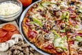 Fresh Thin Crust Supreme Pizza Royalty Free Stock Photo