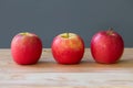 Fresh three apples fruit on table Royalty Free Stock Photo
