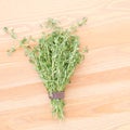 Fresh thyme on a light wooden background Royalty Free Stock Photo