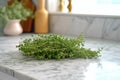 fresh thyme sprigs on a marble countertop