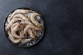 Fresh tiger prawns in a plate with ice