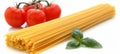 Fresh tomato and basil spaghetti plate on white background for a delightful meal Royalty Free Stock Photo
